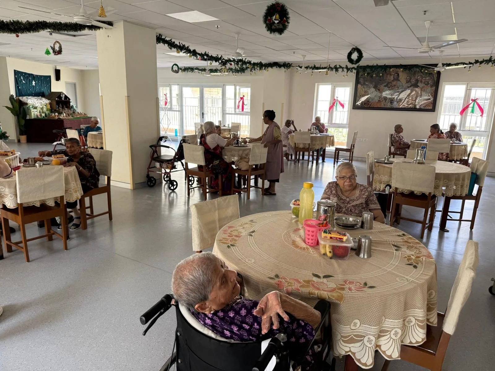 Residents seated at dining tables in a Food Connect partner elder-care home