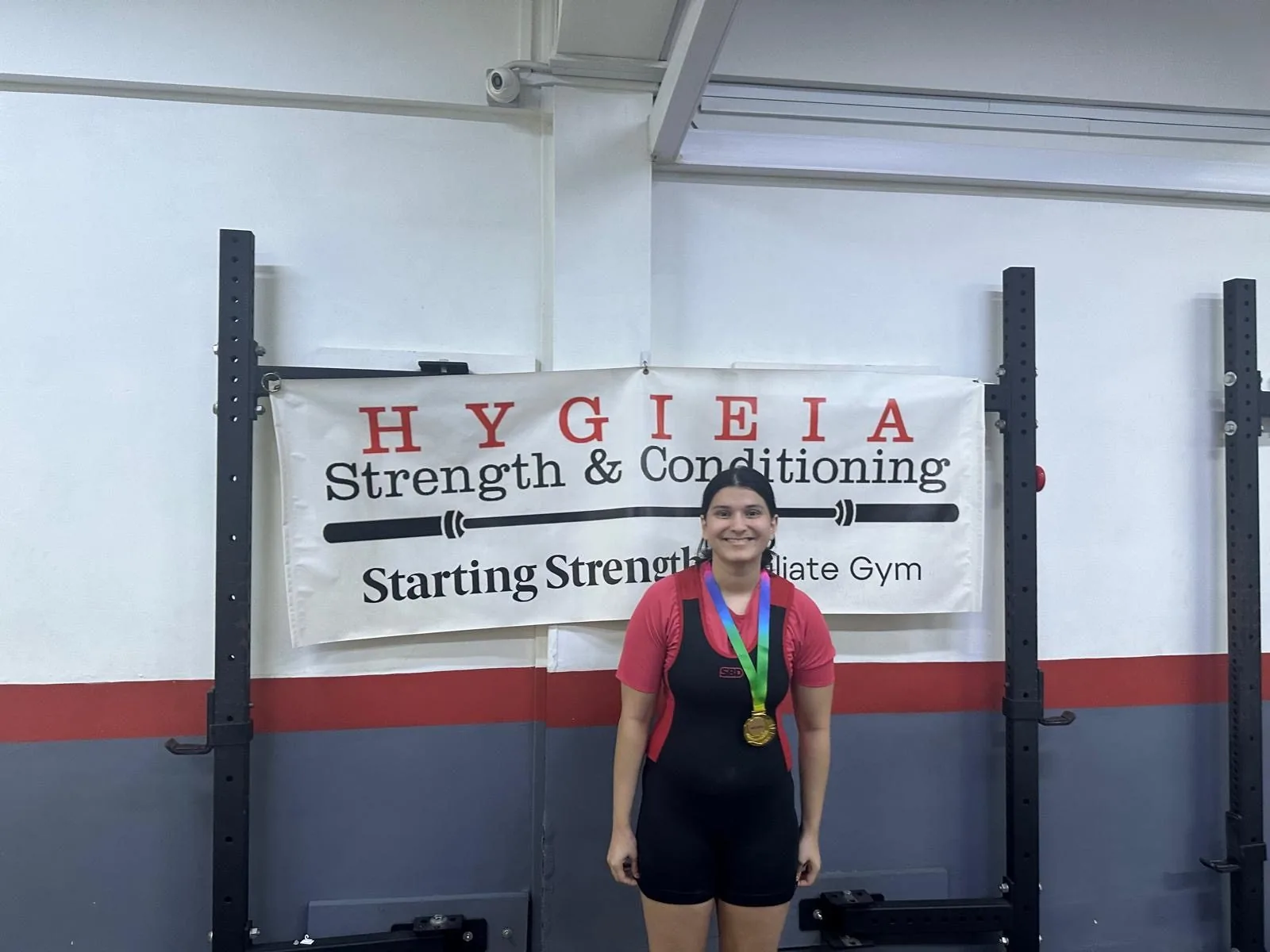 Riya with her medal after the meet